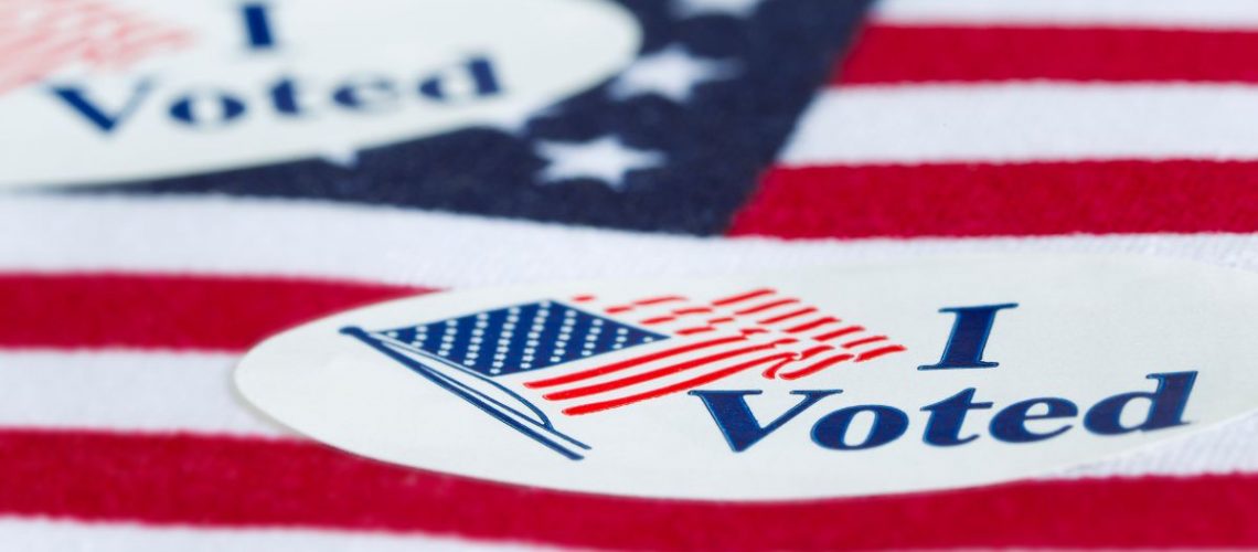 US Flag with I Voted banner for the 2022 November 8th Midterms Elections